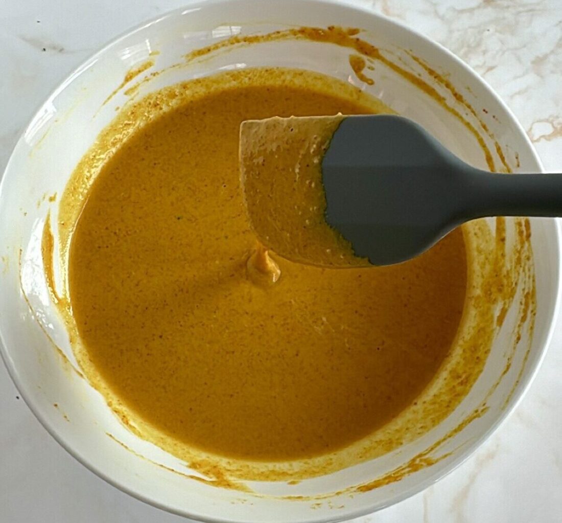 Batter with spatula showing consistency