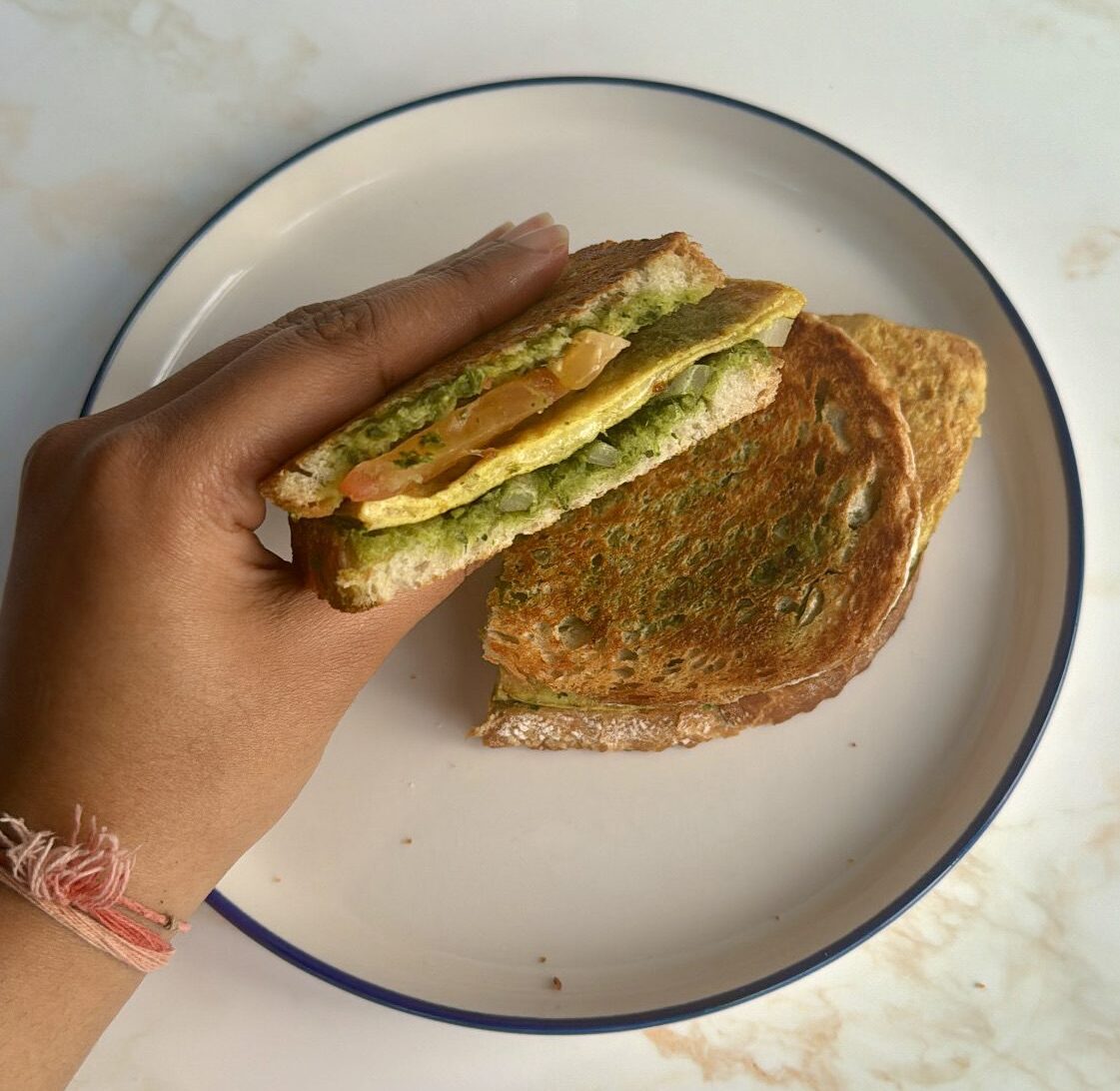 Holding bombay toastie slice