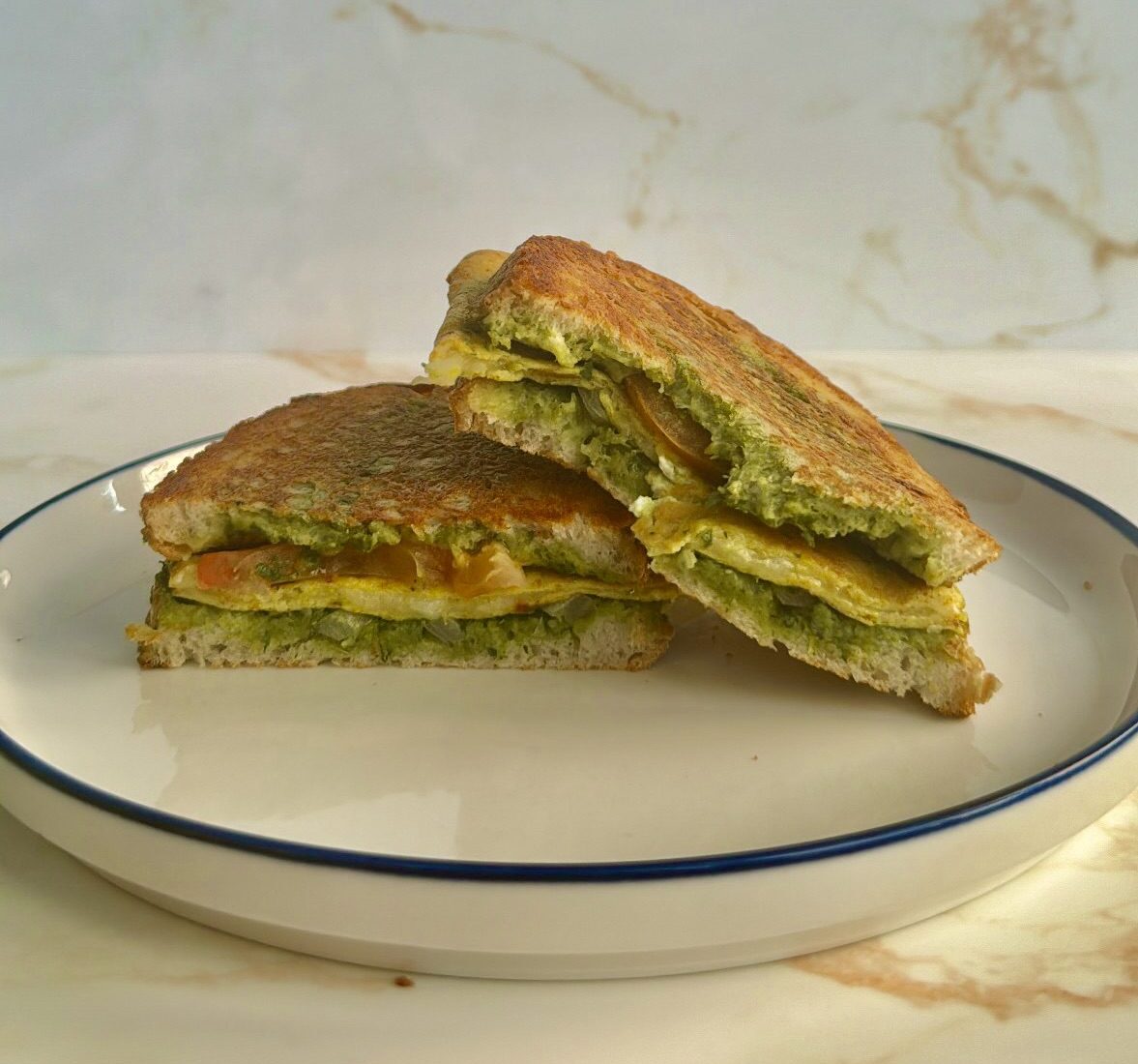 Bombay chutney toastie leaning on top of each other.