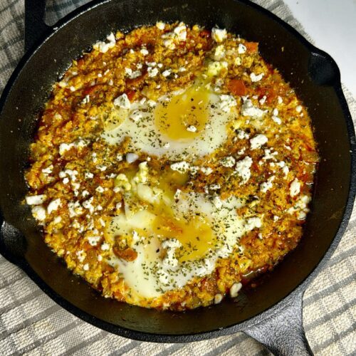 runny eggs in chicken mince sauce