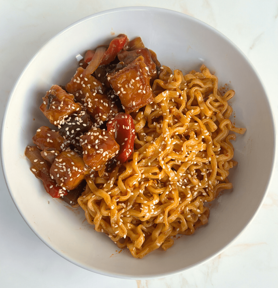 Chilli paneer on left side and chilli noodles on other side