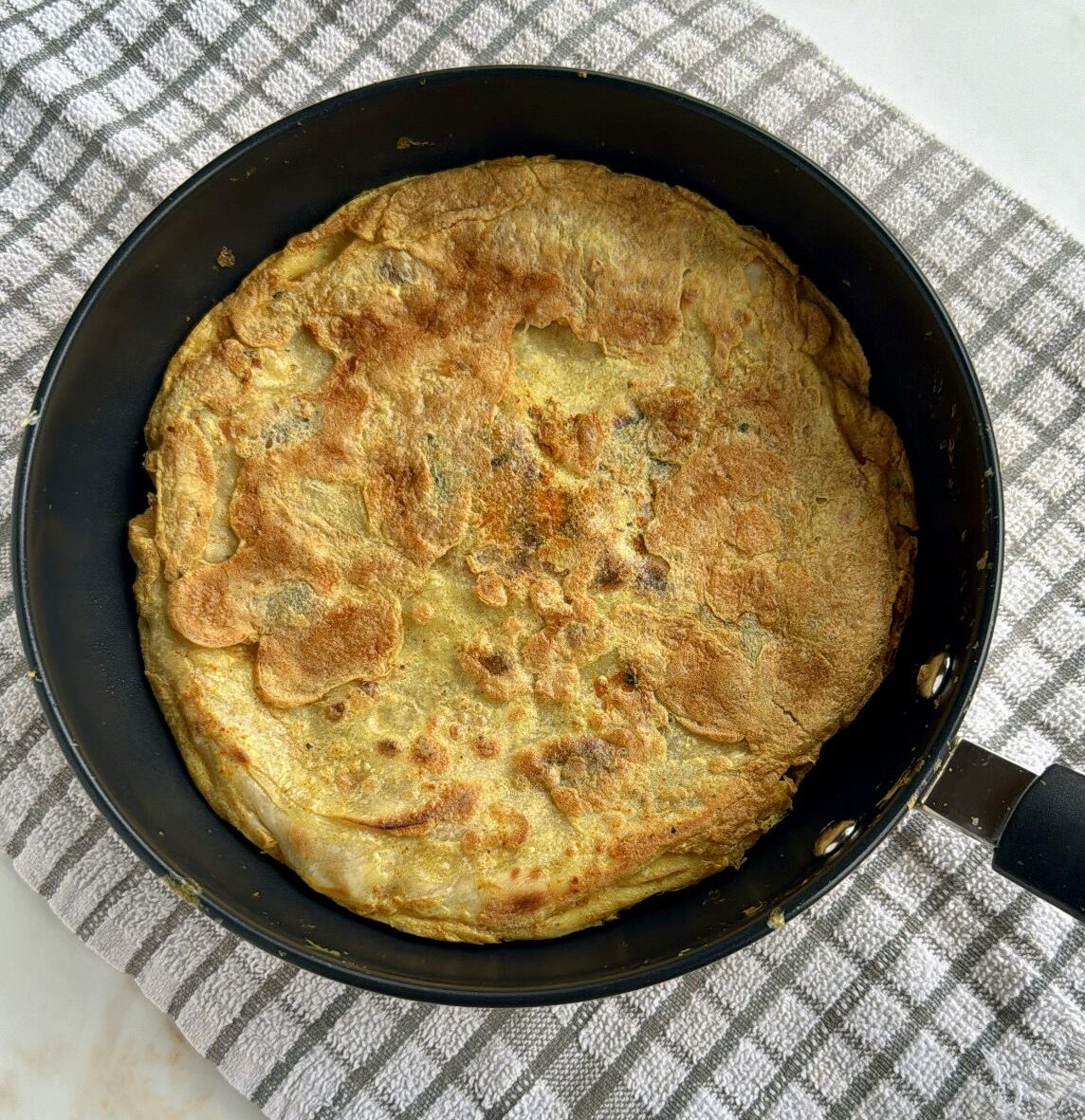 Kati roll (unrolled) in a frying pan