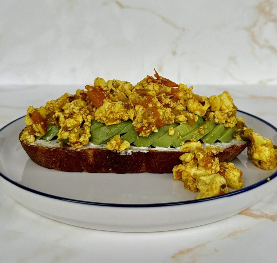 Tofu bhurji on top of avocado, and toast