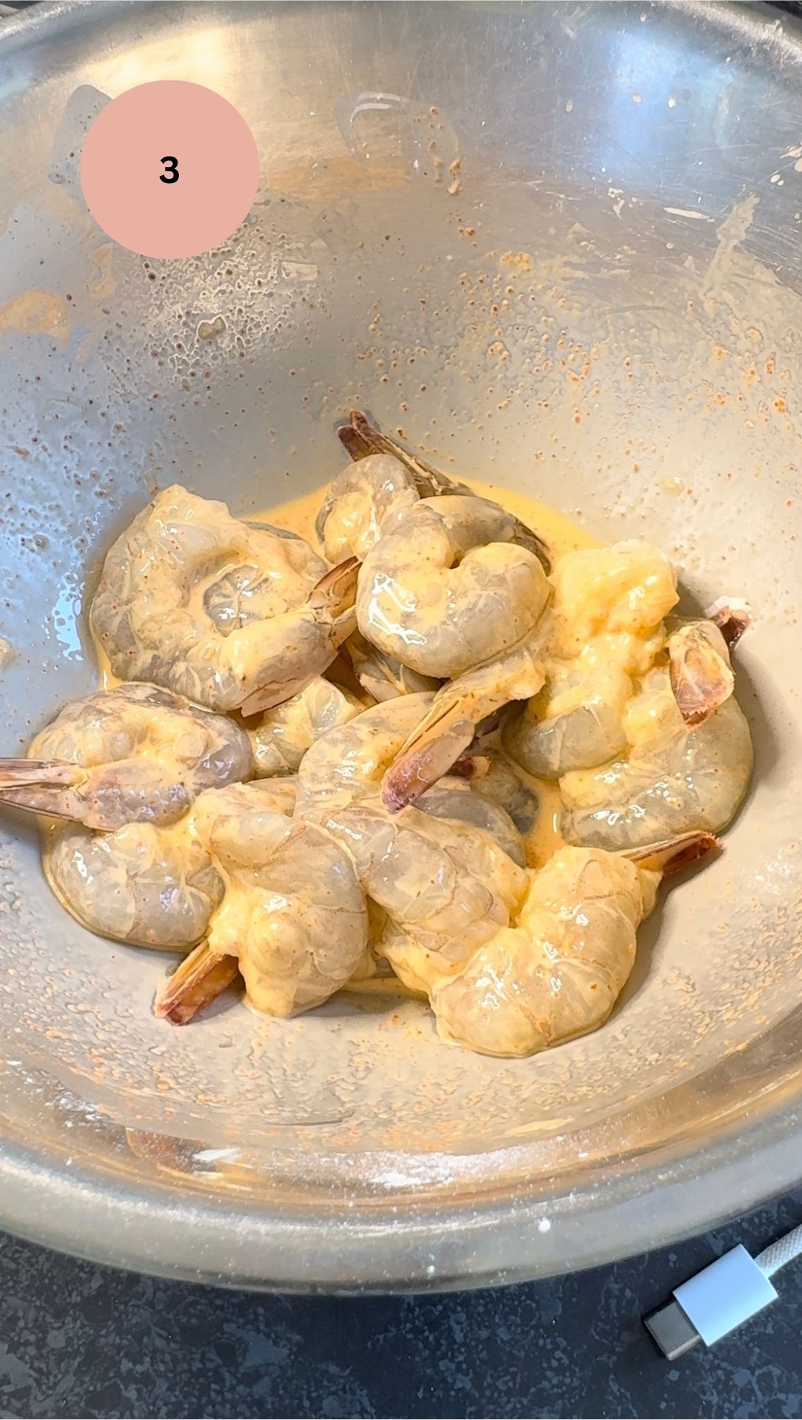 prawns in cornflour batter with water added and mixed