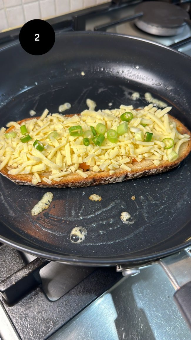 toast with grated cheese, chopped chillis and grated onions