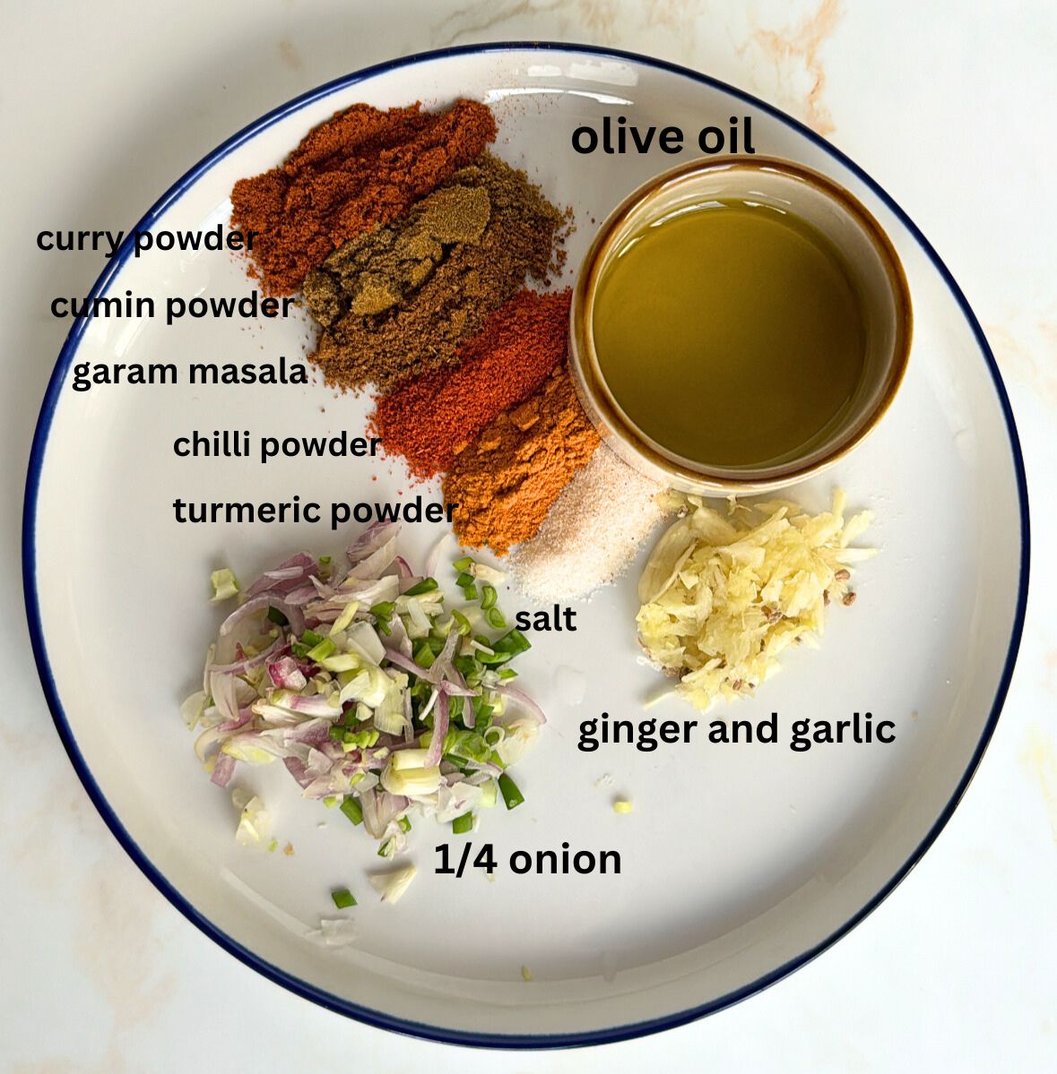 keema marination ingredients laid out on a plate