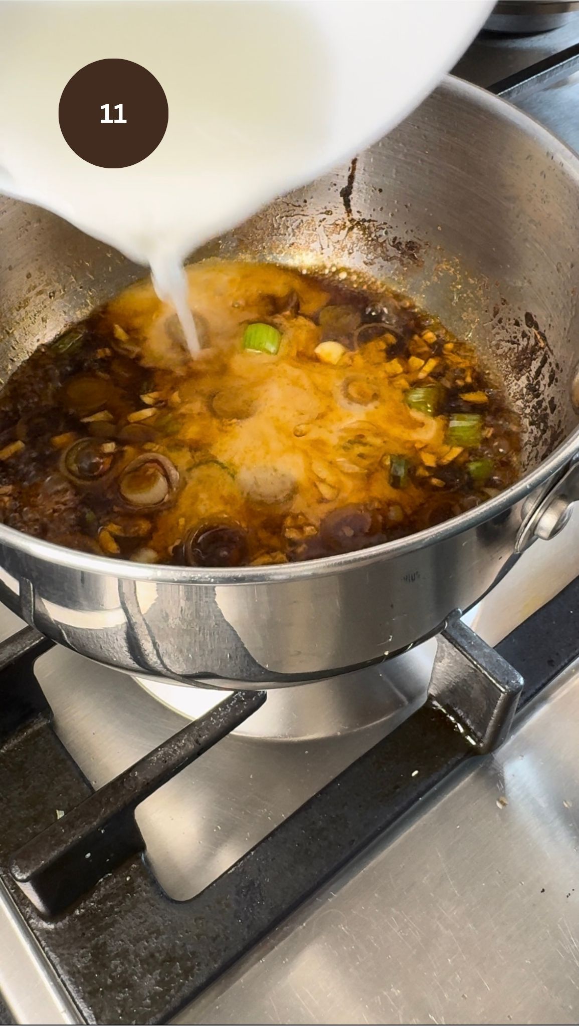 adding cornflour slurry to the gravy to thicken