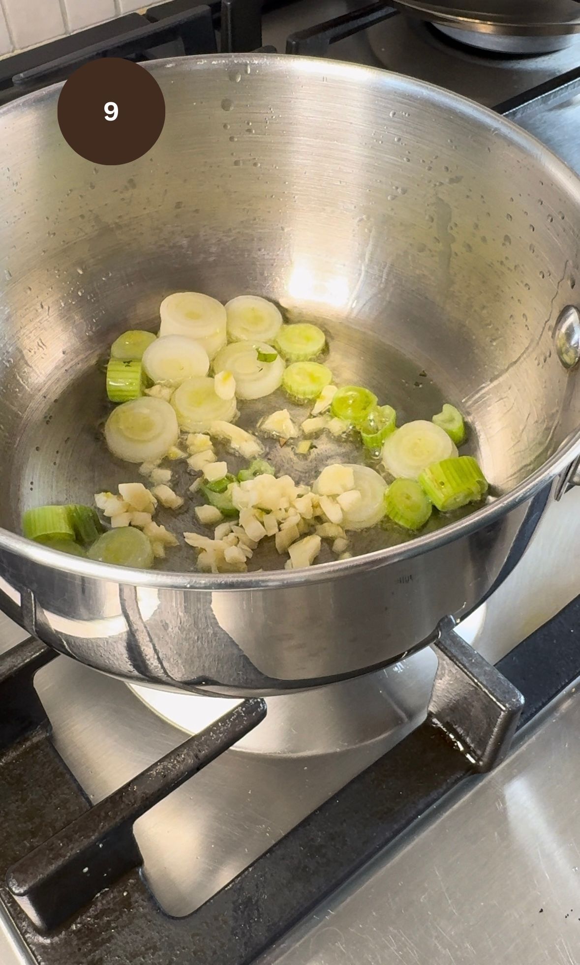 frying spring onions and garlic