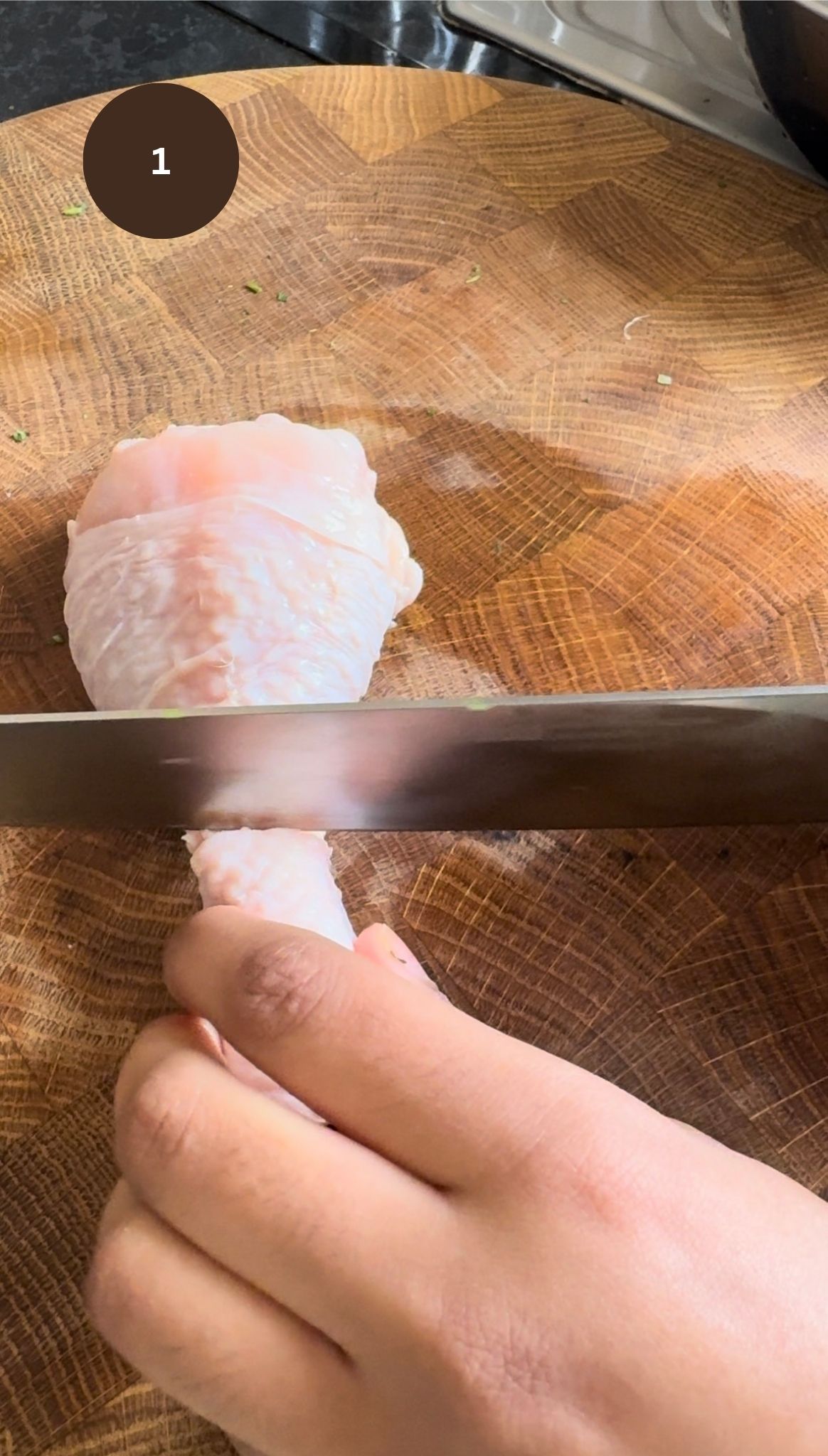 step one, knife cutting through in between the end of the drum and before the meat