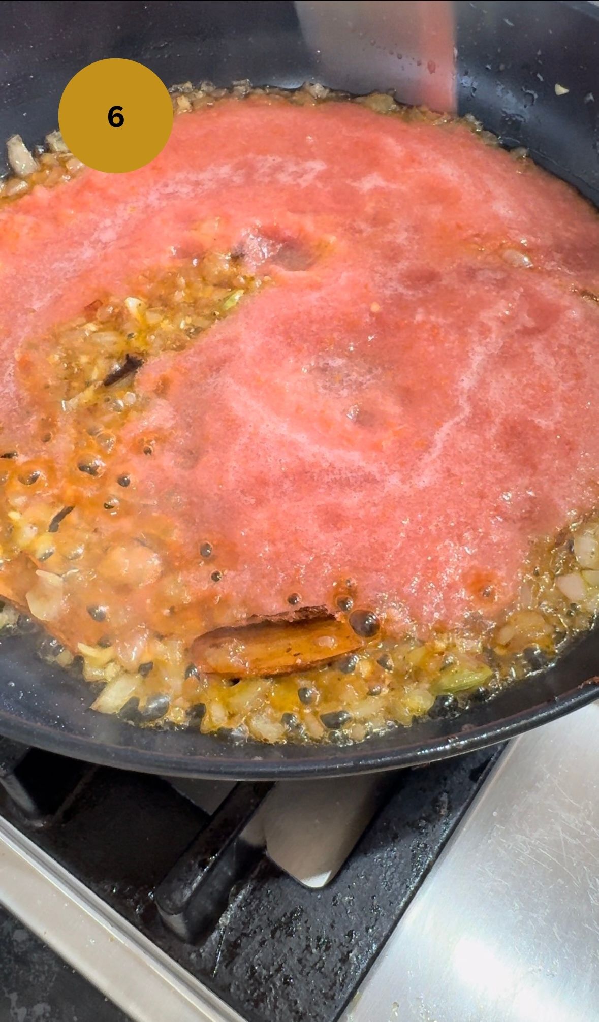 blended tomato juice added to fry pan