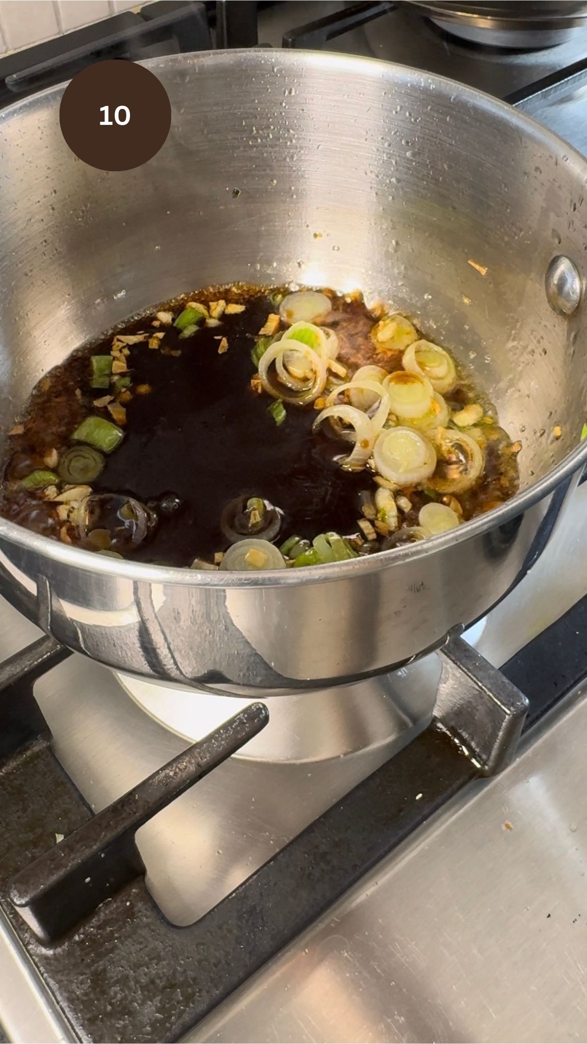 adding all of the sauce in to the pan with aromatics