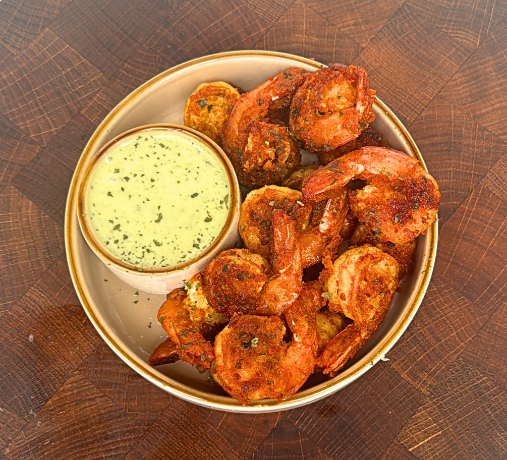 Prawns Koliwala (Masala Prawns Fry), prawns in bowl with chutney on the side