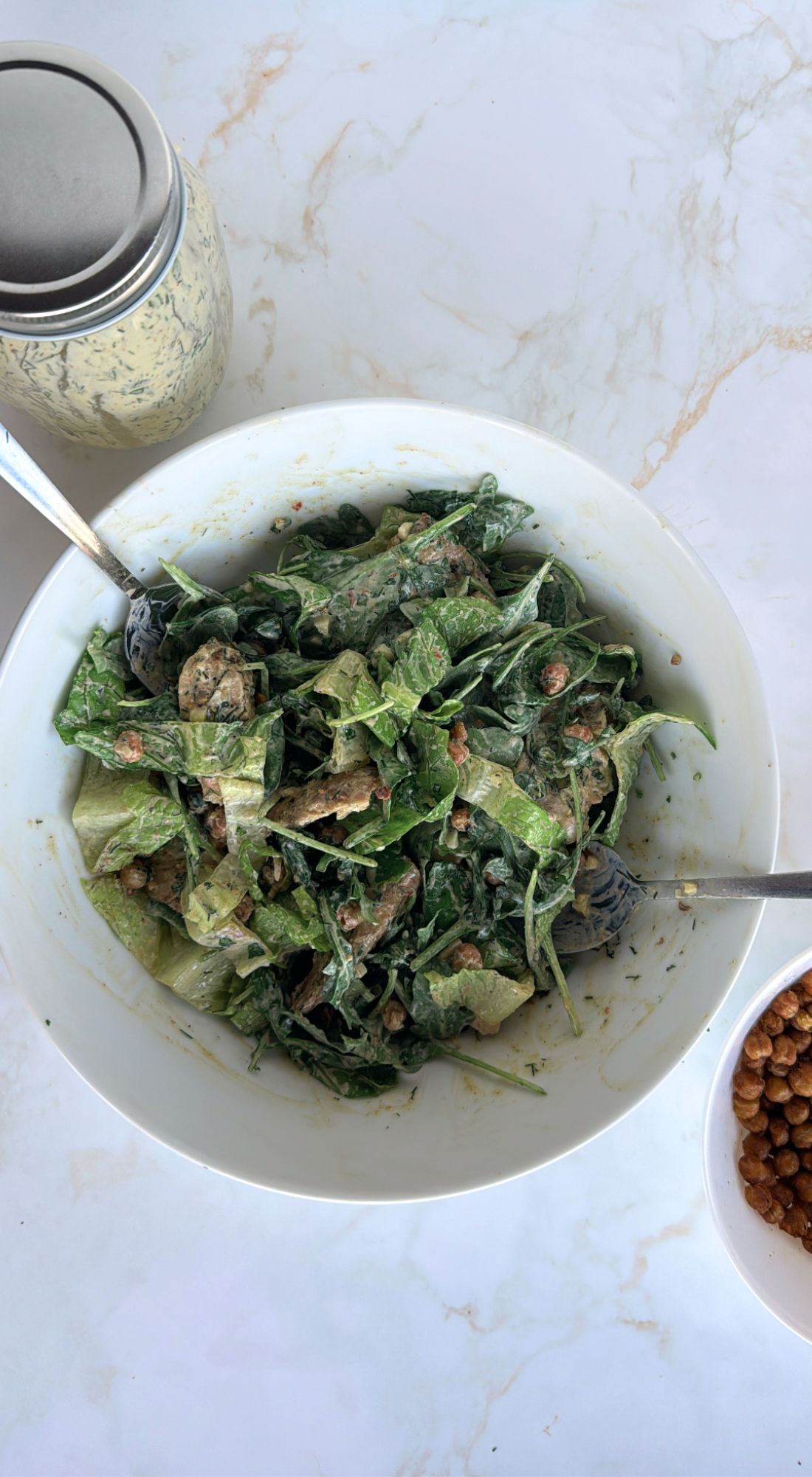 creamy chicken salad mixed into the bowl