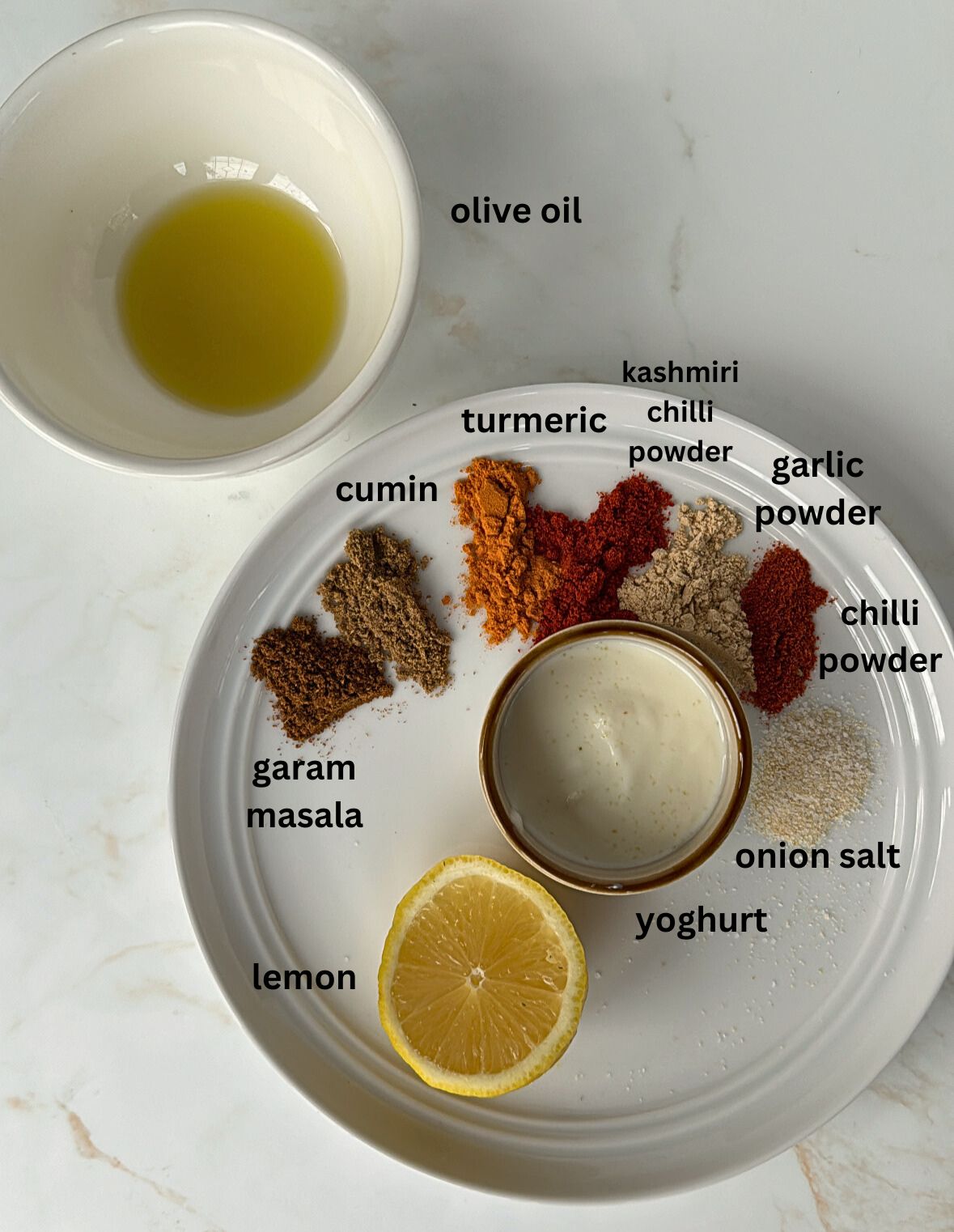 tandoori chicken ingredients laid out on plate